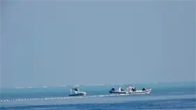 China despliega nueva barrera flotante en arrecife de Scarborough