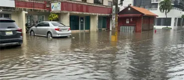 Fuertes lluvias provocan inundaciones en sectores del DN y Santo Domingo