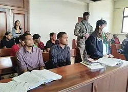 Absuelven a dos hombres acusados de matar a vigilante en banco de Santiago