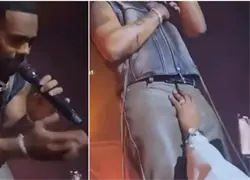 Una fan manosea la entrepierna del cantante de R&B durante un concierto