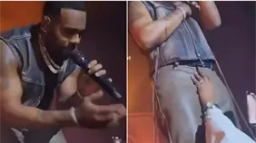 Una fan manosea la entrepierna del cantante de R&B durante un concierto