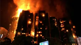 Drones, grúas y voluntarios sostienen la esperanza en un Hong Kong azotado por la tragedia