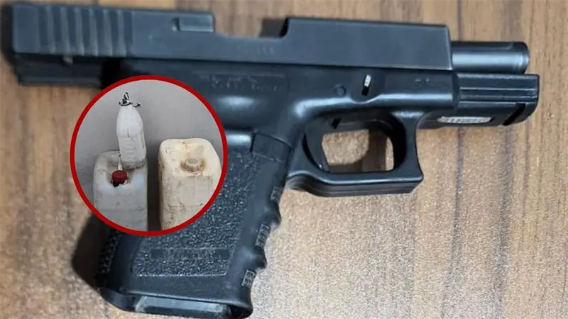 Arrestan a dos personas por posesión ilegal de arma de fuego y ron adulterado