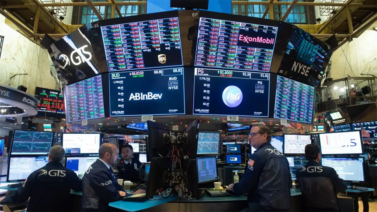 Wall Street cierra en verde tras datos de inflación más bajos y fuerte previsión de Micron