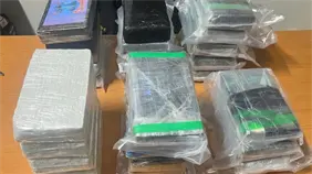 DNCD captura dos alemanes e incauta en el AILA otros 28 paquetes presumiblemente coca&iacute;na