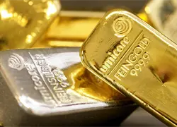 El oro y la plata no logran mantener los m&aacute;ximos hist&oacute;ricos alcanzados de madrugada