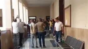 Le vociferan asesinos, a los hermanos Espaillat en el Palacio de Justicia