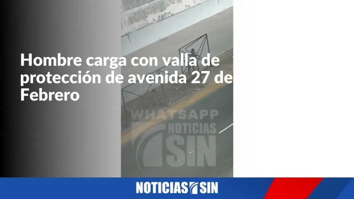 Hombre carga con valla de protección en 27 de Febrero