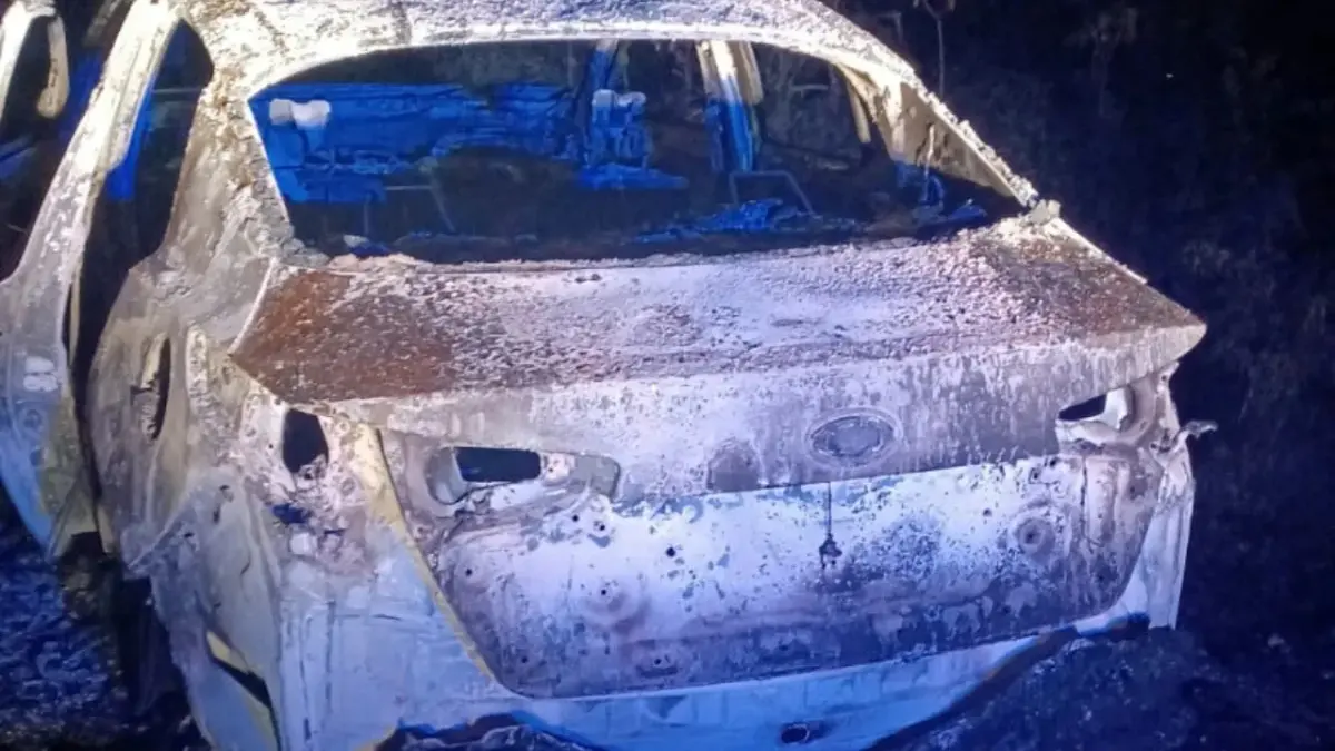 Encuentran calcinado vehículo de empleado de la Procuraduría ultimado en Santiago