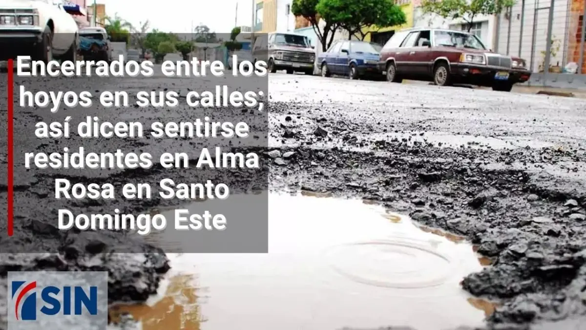 Encerrados entre los hoyos en sus calles, alegan los residentes en Alma Rosa en Santo Domingo Este