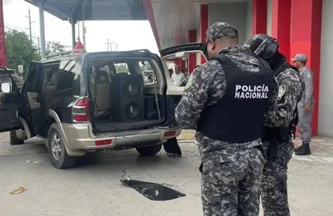 Asalto en Banco Banreservas deja al menos dos personas heridas