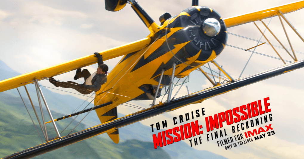 Hombre colgado de un avión en picada