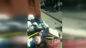 Comunitarios del Ensanche Quisqueya y Hato Nuevo exigen soluciones ante vertedero improvisado y deterioro vial