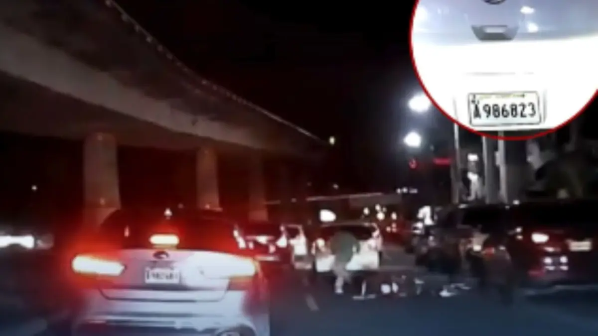 Captado en cámara:  Conductor casi arrolla a motorista y emprende la huida